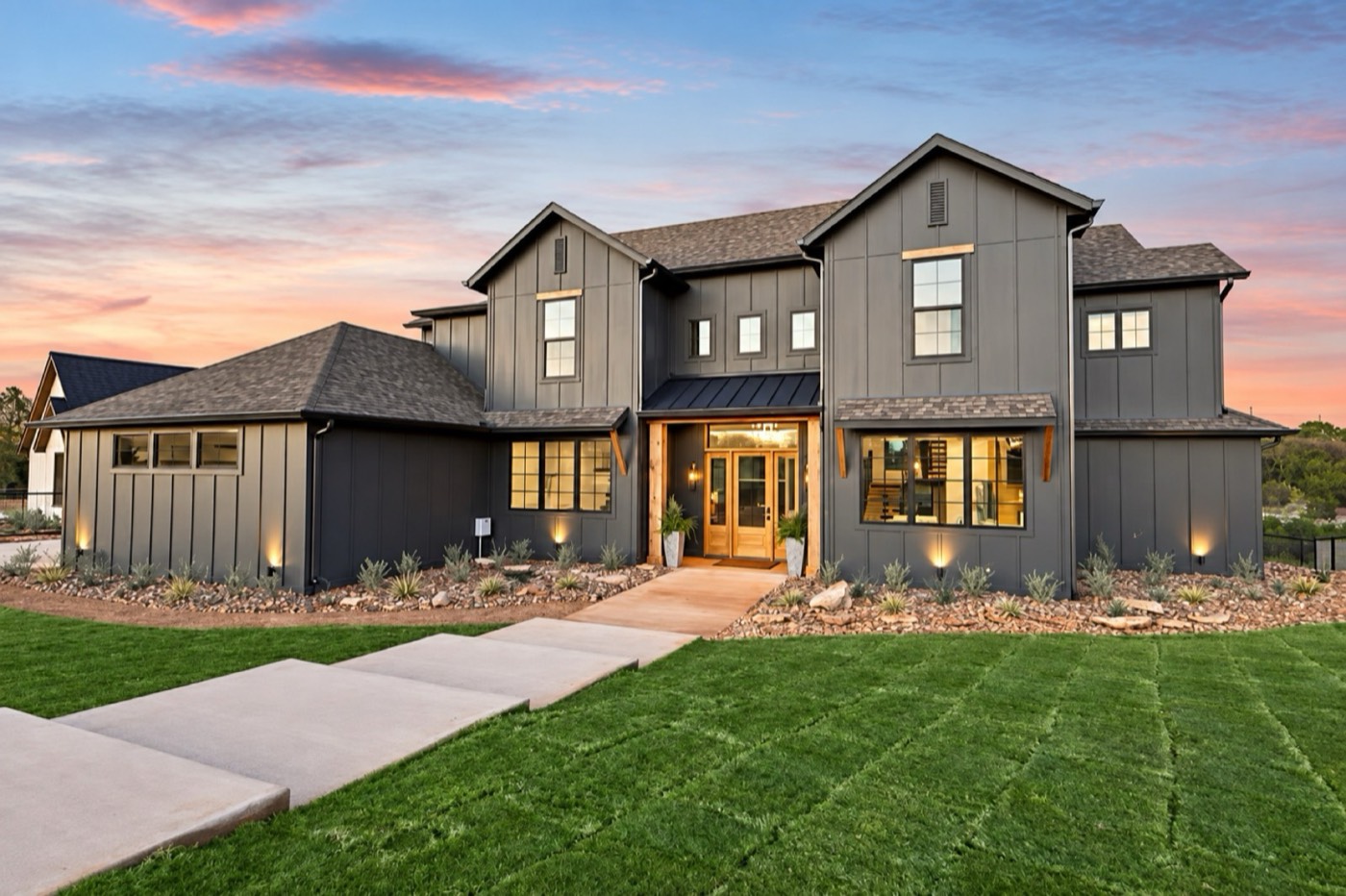 Landscaping with a green lawn and planted beds